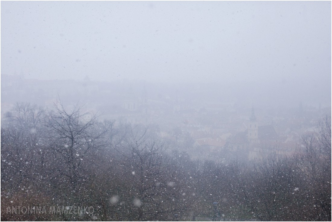Snow falls over old city of Prague in April